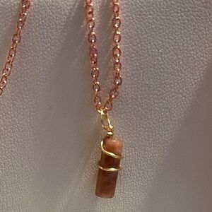 Elegant Gold and Pink Pendant Necklace
